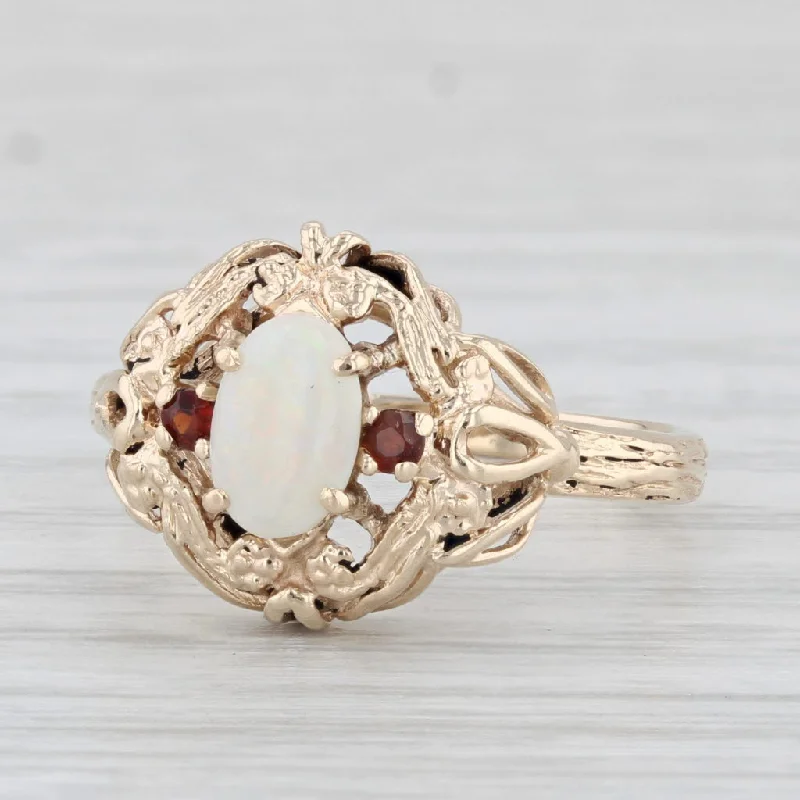 timeless diamond engagement rings for women-Opal Oval Cabochon Garnet Ring 10k Yellow Gold Size 6.5