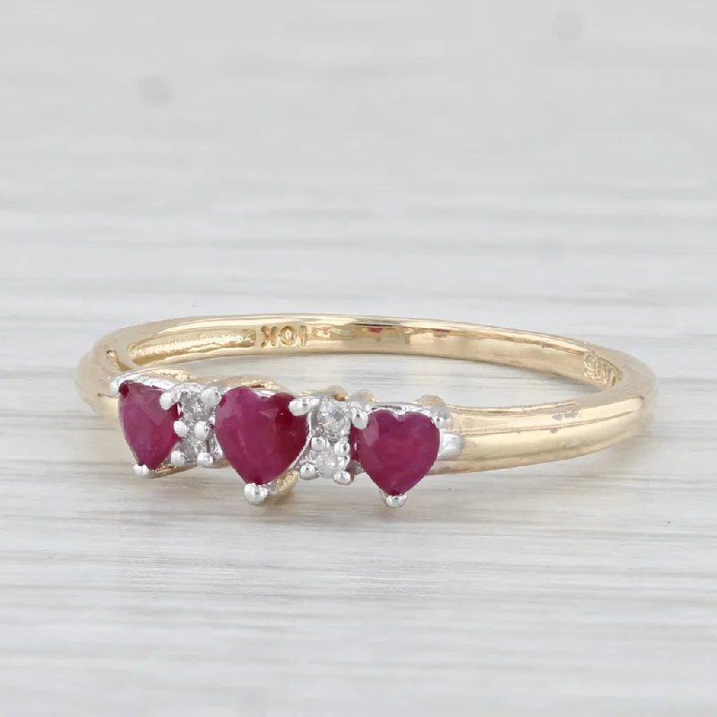 engagement rings with vintage designs for women-0.50ctw 3-Stone Heart Ruby Ring 10k Yellow Gold Size 7.25 Stackable